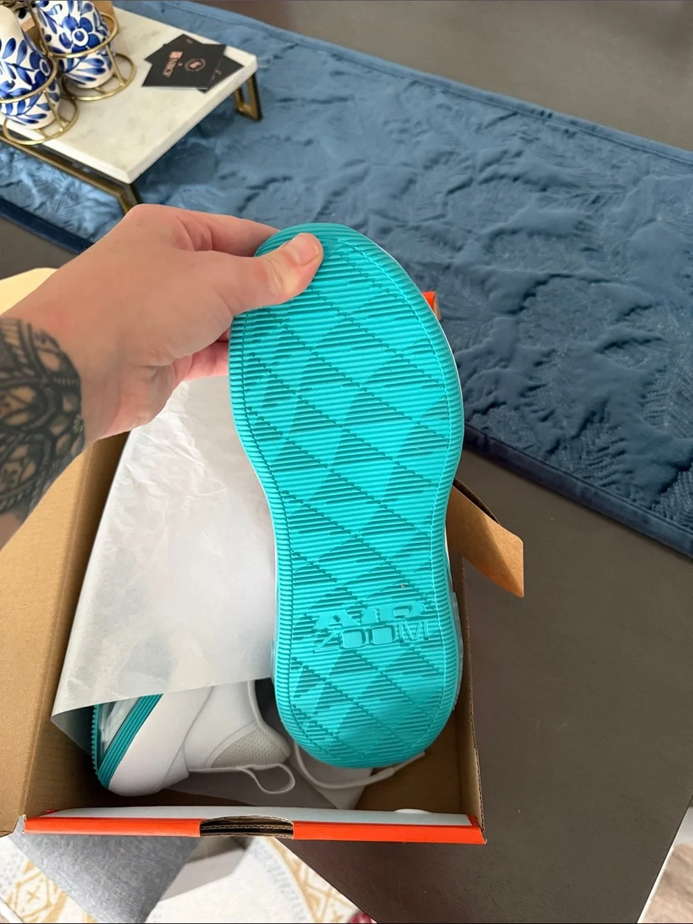 Nike White Sneakers with Teal Swoosh and Teal Accents